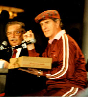 Some photos taken by Neal Conway at the 1985 celebration of 25th Anniversary of Harden & Weaver's WMAL morning show. Above: Frank Harden and Jack Weaver with Sonny Jurgenson and Sam Huff. Right: Bill Mayhugh stops by with Montgomery Donuts.